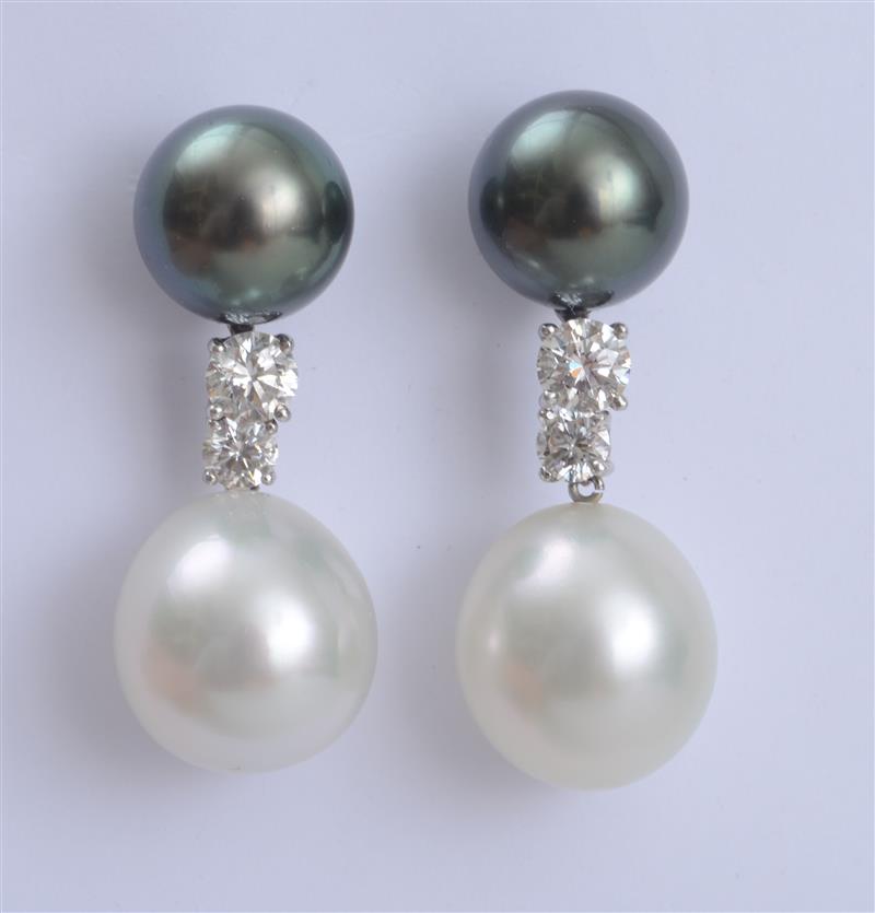 Appraisal: PAIR OF BLACK AND WHITE SOUTH SEA PEARL AND DIAMOND