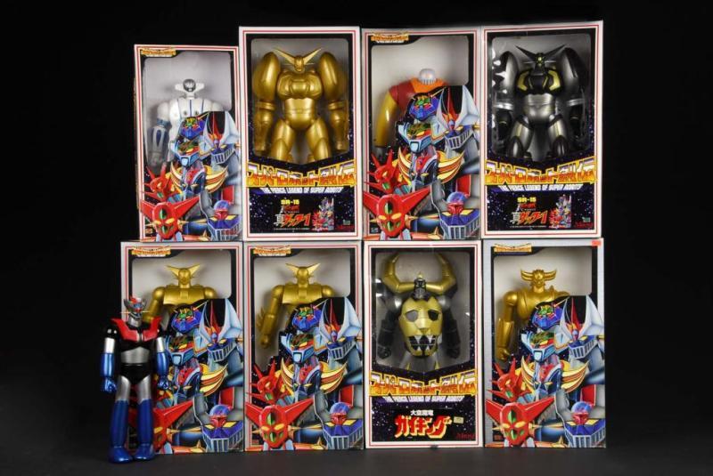 Appraisal: Large Vinyl Superhero Robots w Boxes Description Japanese Marmit