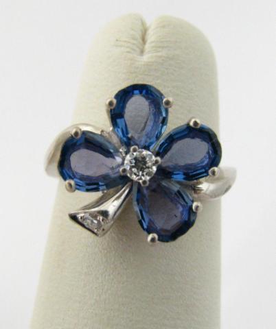 Appraisal: k white gold tanzanite leaf clover ring with diamond center