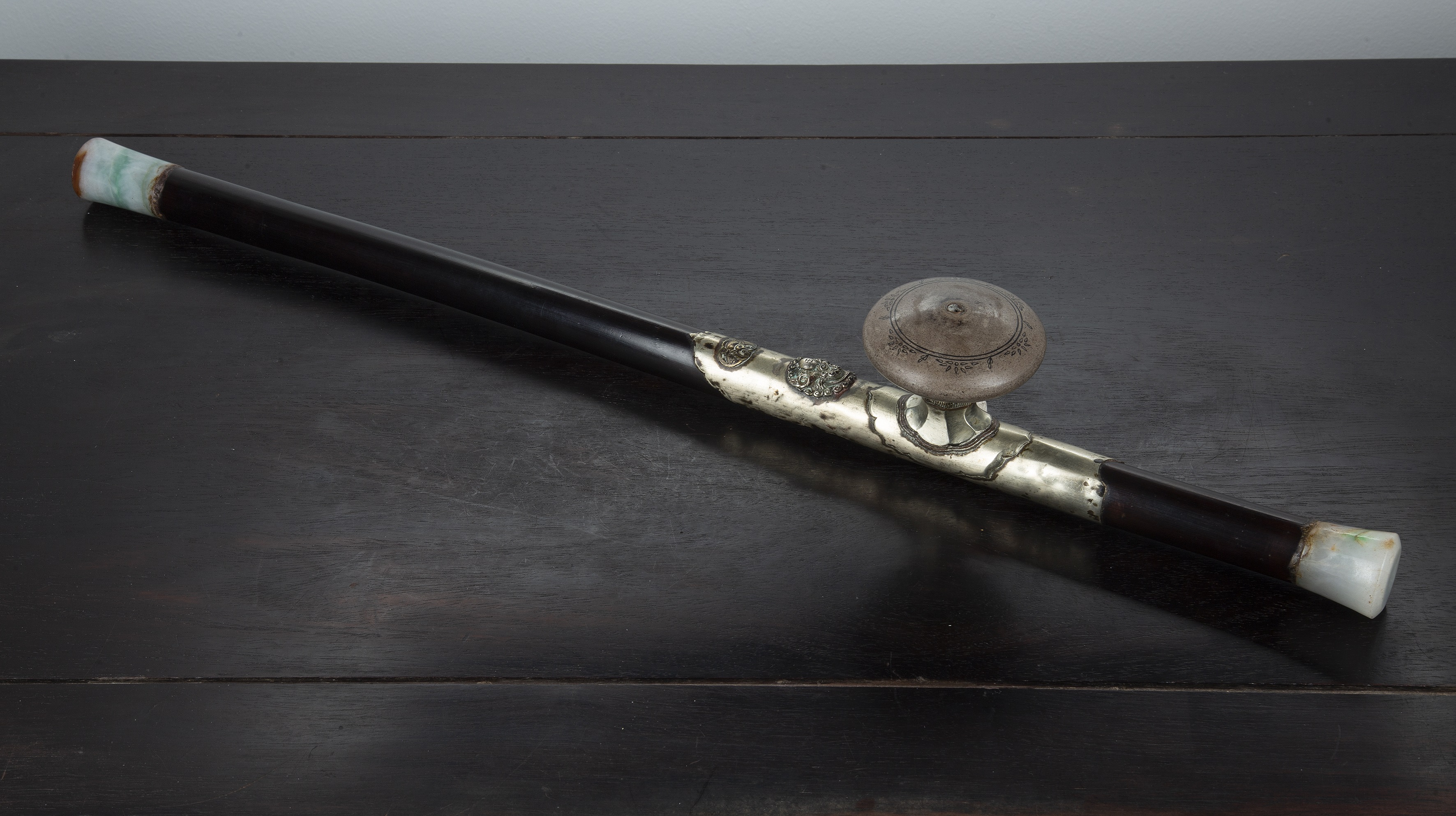 Appraisal: Blackwood opium pipeChinese late th Century with jade mouthpiece and