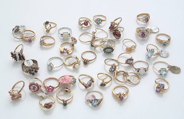 Appraisal: A collection of forty-two diamond gem-set gold and metal rings