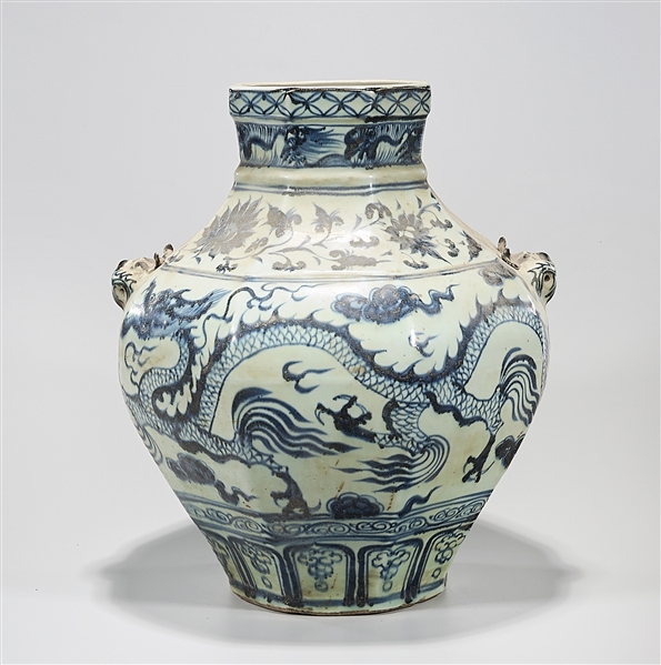 Appraisal: Chinese blue and white porcelain octagonal vase depicting dragons chasing