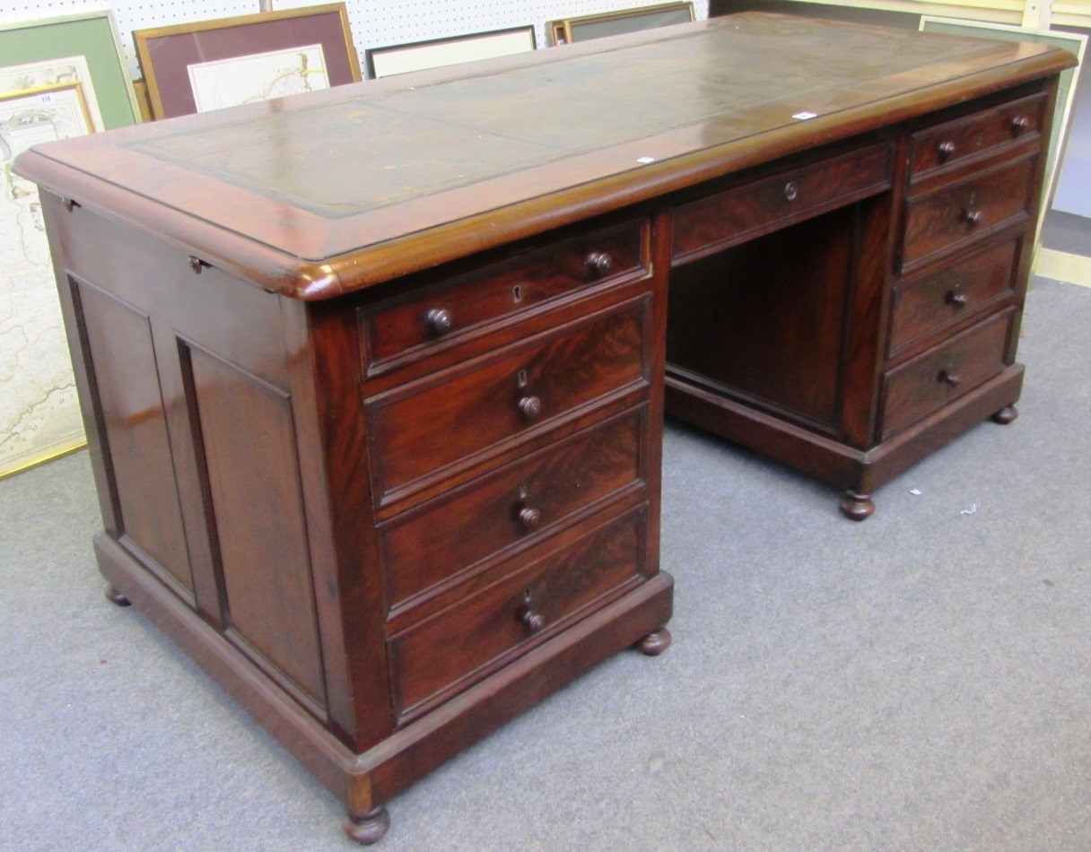 Appraisal: A th century French mahogany free standing pedestal desk with