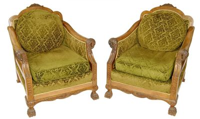 Appraisal: A pair of carved walnut bergere chairs upholstered in a