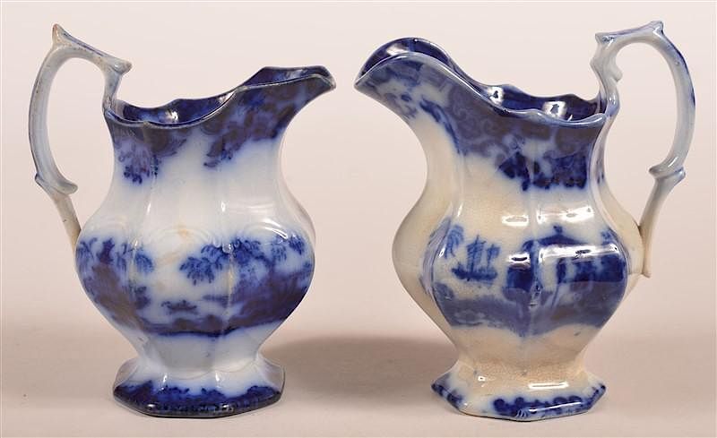 Appraisal: Two Flow Blue Ironstone China Cream Pitchers Two Flow Blue