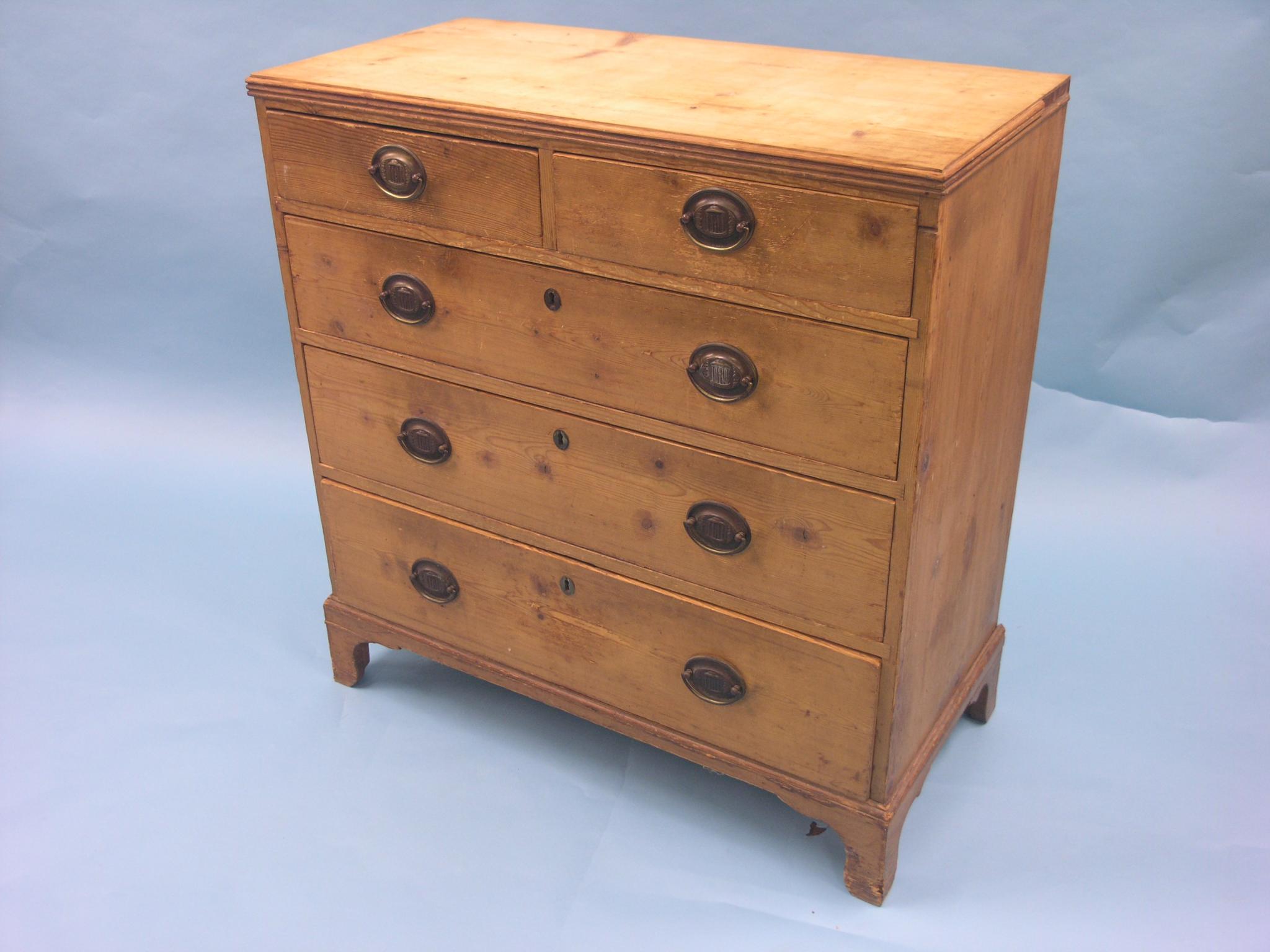 Appraisal: An early Victorian stripped pine chest two short and three