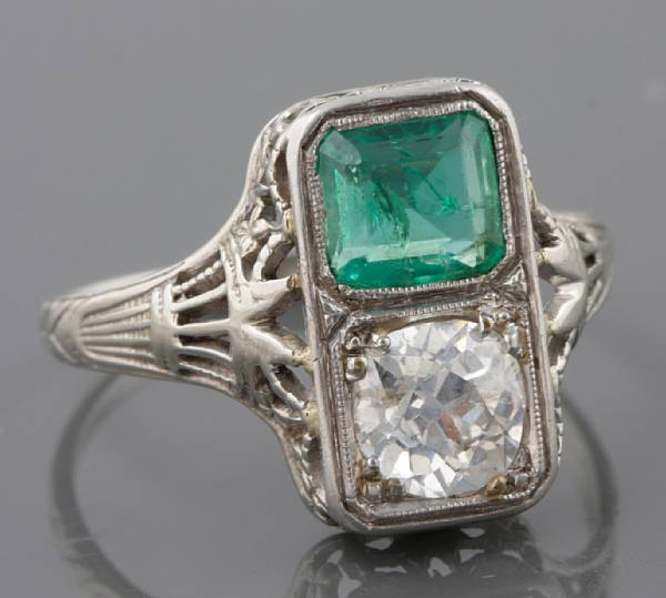 Appraisal: A diamond emerald and k white gold two stone ring