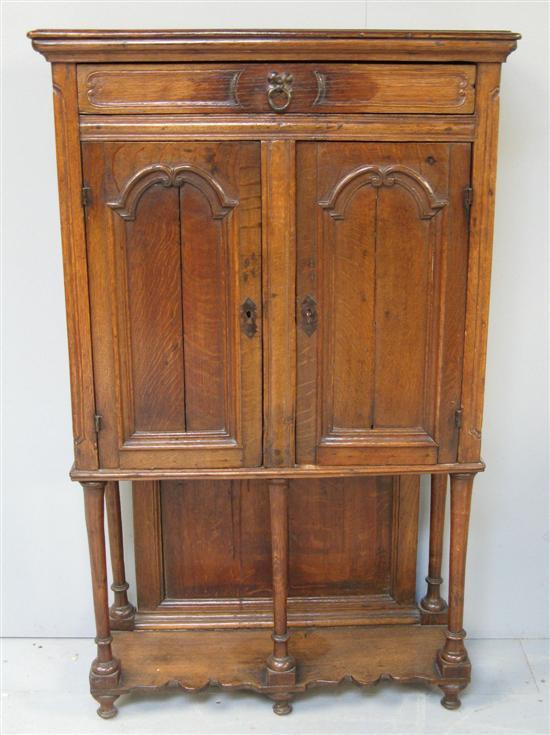 Appraisal: French provincial oak panelled side cupboard th th century with