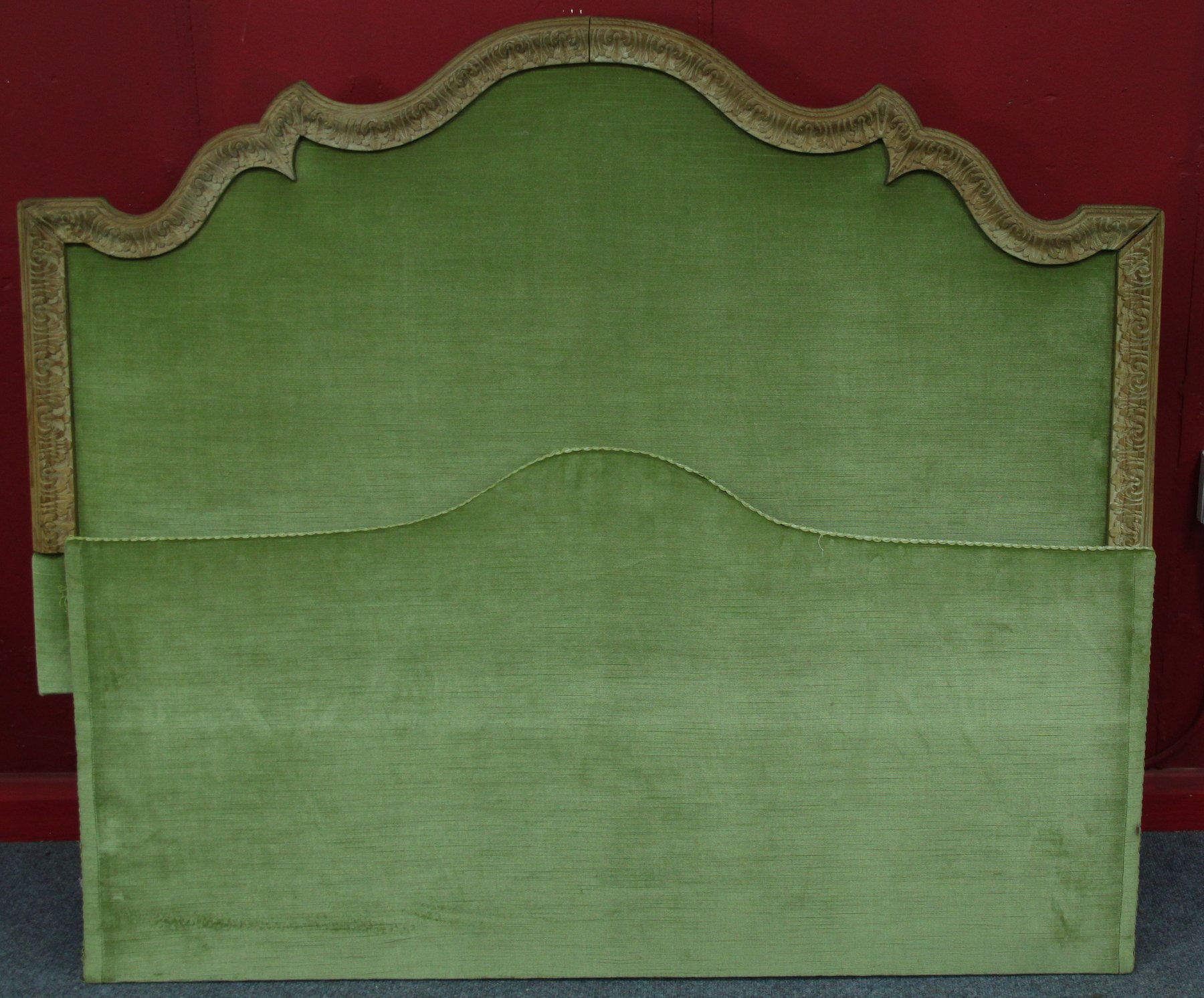 Appraisal: A carved wooden upholstered head and foot board cm wide