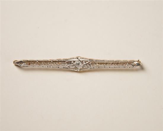 Appraisal: A Gold and Diamond Bar Pin K marked yellow gold