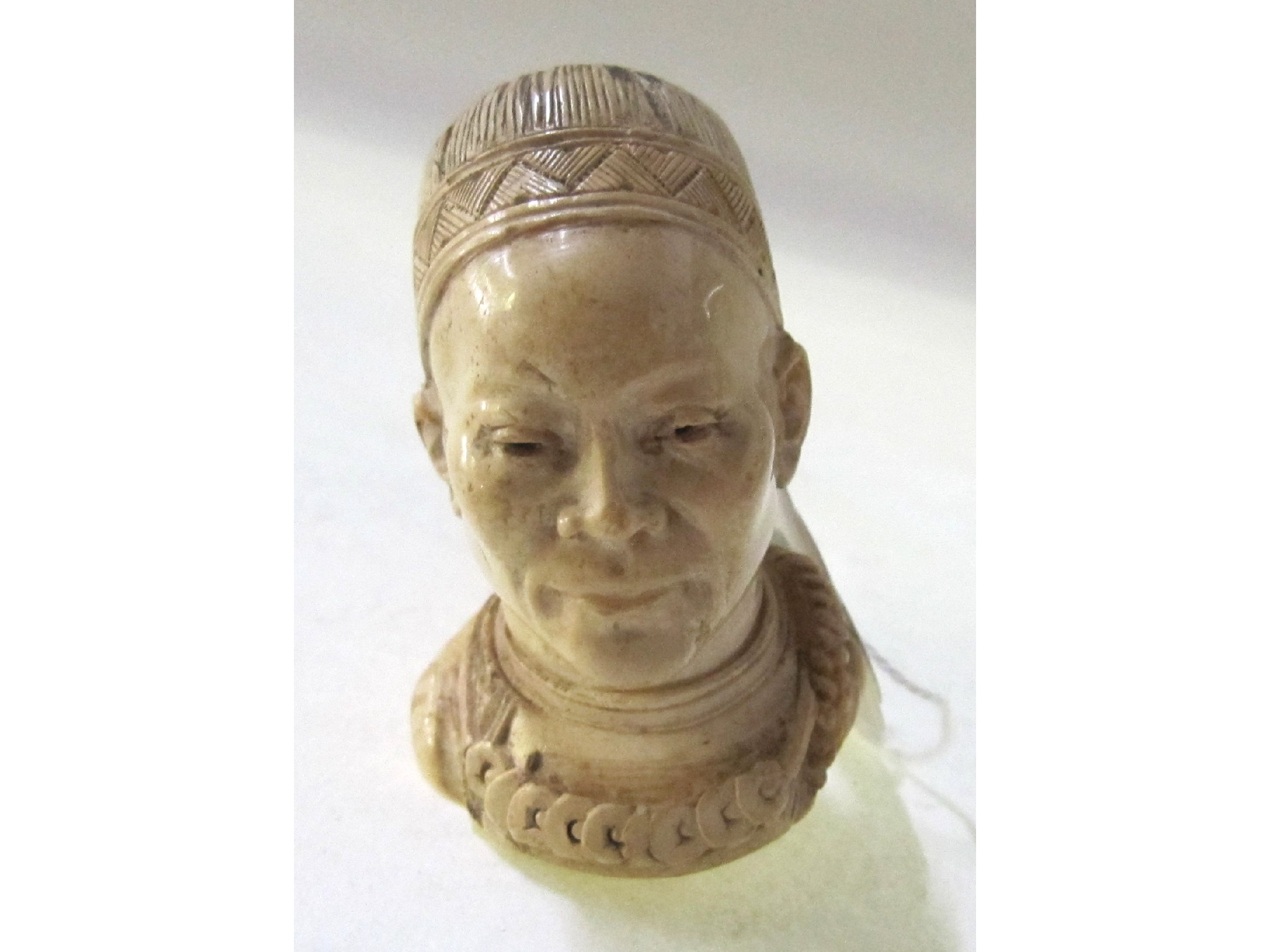 Appraisal: A pipe with bowl modelled as a Chinese man's head