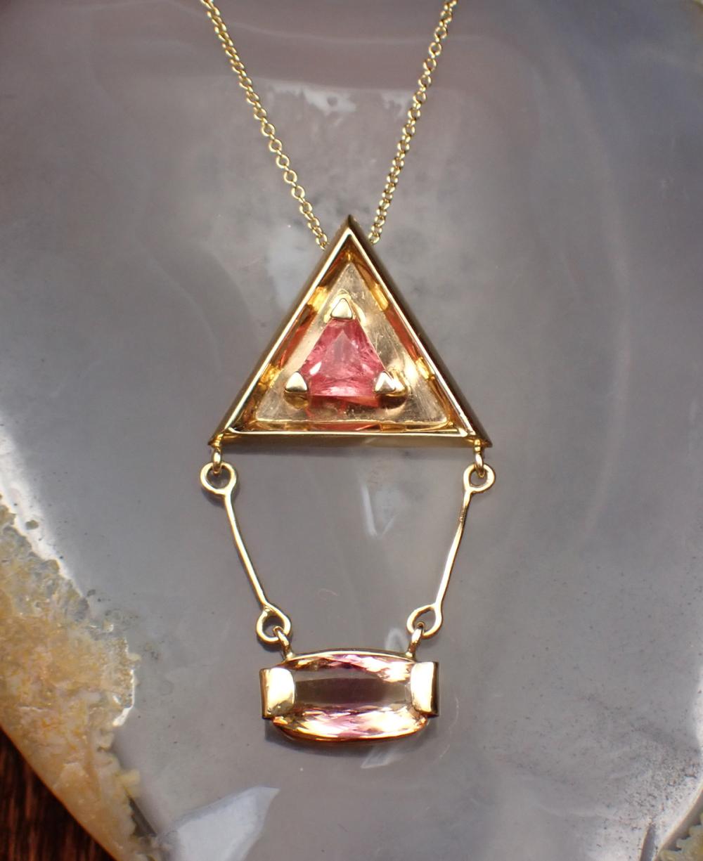 Appraisal: PINK TOURMALINE AND BI COLOR TOPAZ PENDANT NECKLACE with an