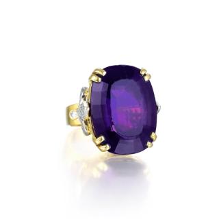 Appraisal: An Amethyst and Diamond Ring Set with an amethyst weighing