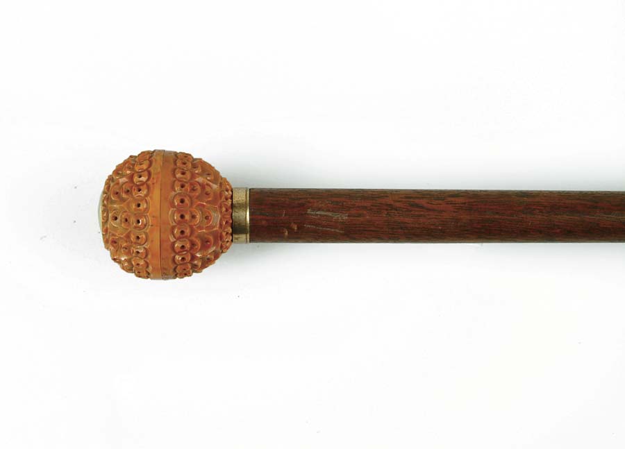 Appraisal: POMANDER CANE Japanese carved wood or nut ball with pierced