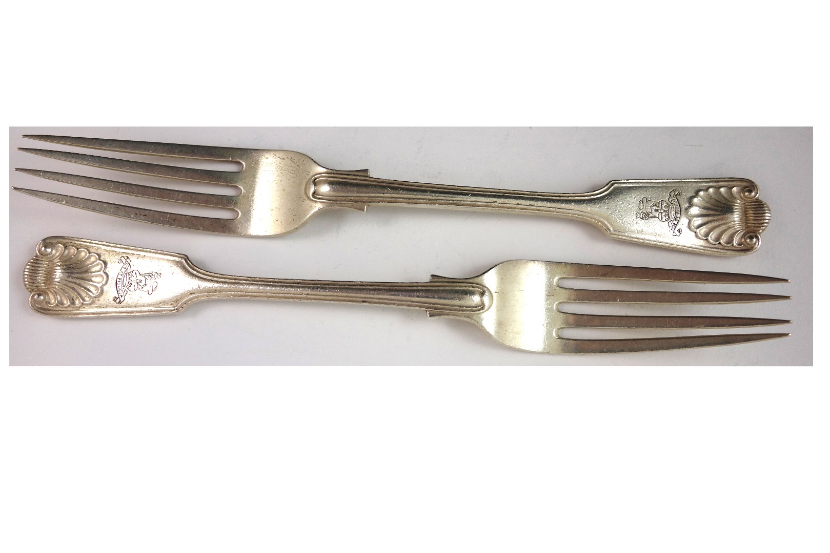 Appraisal: A pair of Edwardian silver fiddle thread and shell pattern