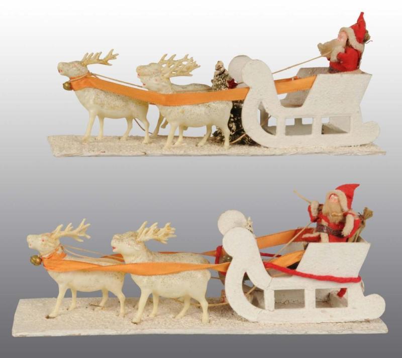 Appraisal: Lot of Santa in Sleigh with Celluloid Deer Description Japanese