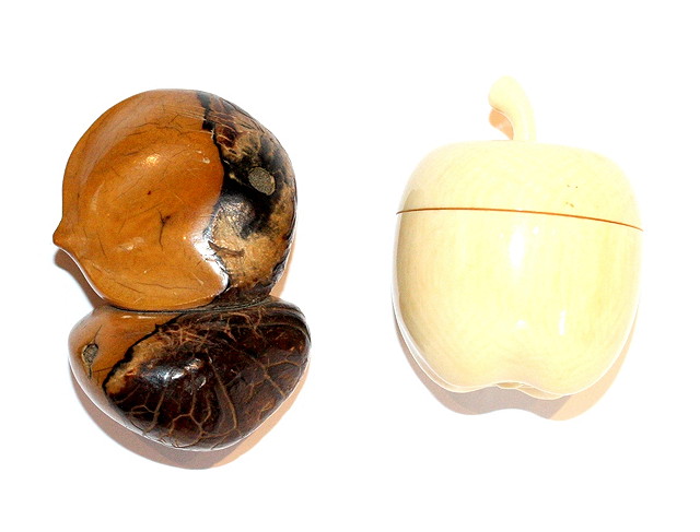 Appraisal: A CARVED IVORY BOX in the form of an apple