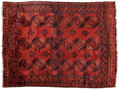 Appraisal: Turkoman rug three rows of guls on burgundy red field