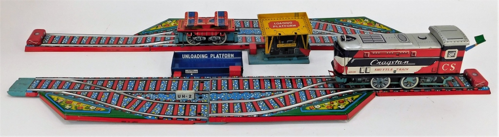 Appraisal: CRAGSTAN SHUTTLE TRAIN AND LOADING PLATFORM Japan th CenturyVibrant tin