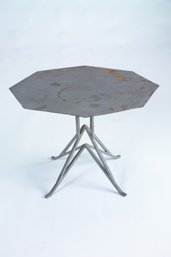 Appraisal: FRANK LLOYD WRIGHT Metal occasional table with octagonal top on