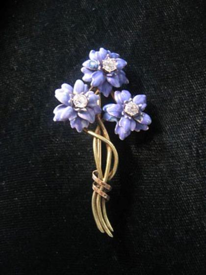 Appraisal: Enamel and diamond posy pin Purple enameled posies each displaying