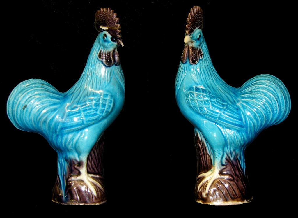 Appraisal: Pair of Chinese porcelain cockerels with blue and purple glaze