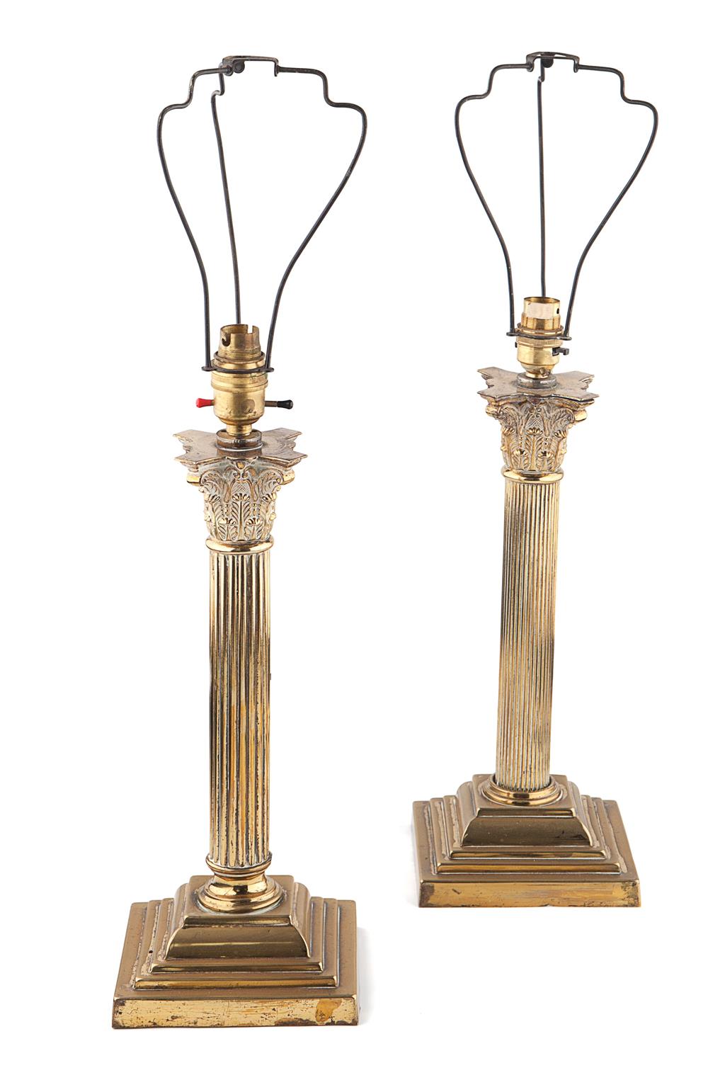 Appraisal: TWO BRASS CORINTHIAN COLUMN TABLE LAMPS Together with a plaster