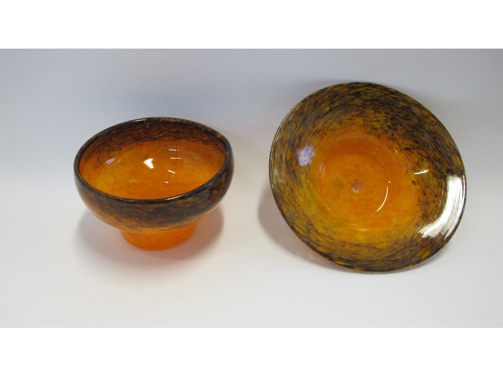 Appraisal: Orange and brown glass bowl and a similar dish