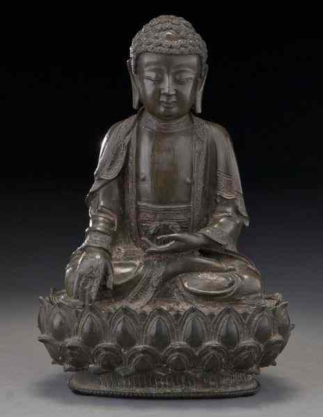 Appraisal: Chinese Ming bronze Buddhaseated on a lotus throne hands in