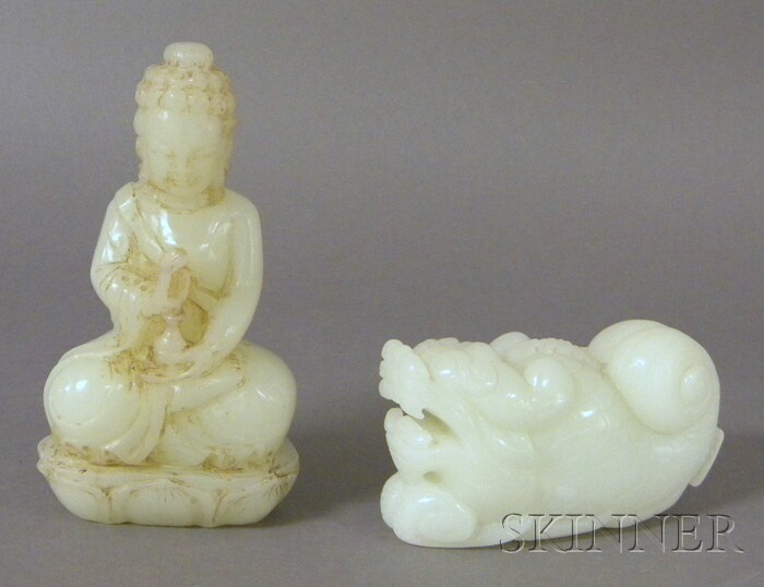 Appraisal: Asian White Glass Makara and a Buddha ht to in