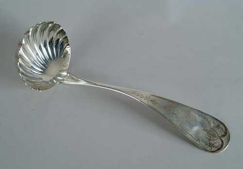 Appraisal: SHELL SHAPED COIN SILVER PUNCH LADLE BY DUHME CO Large