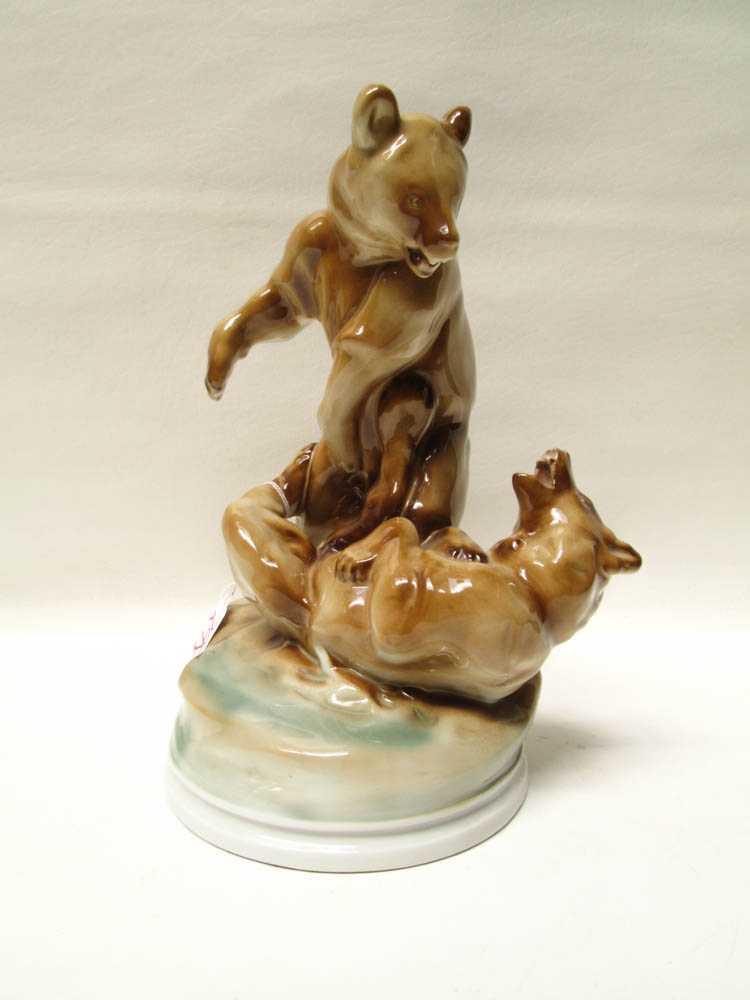 Appraisal: ZSOLNAY PORCELAIN WILDLIFE SCULPTURE depicting two bears at play Height