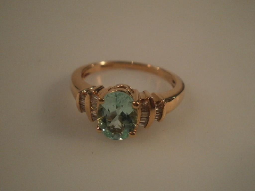 Appraisal: A dress ring set with a pale turquoise central stone