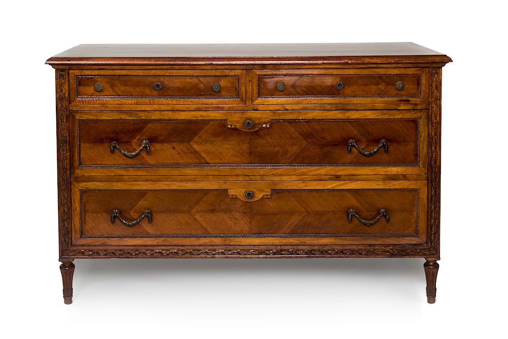 Appraisal: A Louis XVI Style Carved Fruitwood Commode Height x width