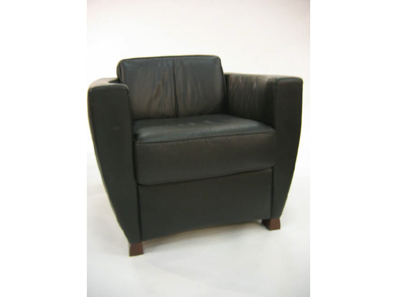 Appraisal: KEILHAUER CANADIAN Black leather upholstered armchair h w Estimate -