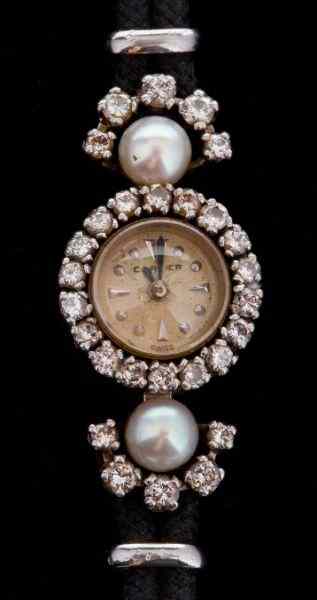 Appraisal: Vintage Lady's Wristwatch Cartierdiminutive circular form with champagne face signed