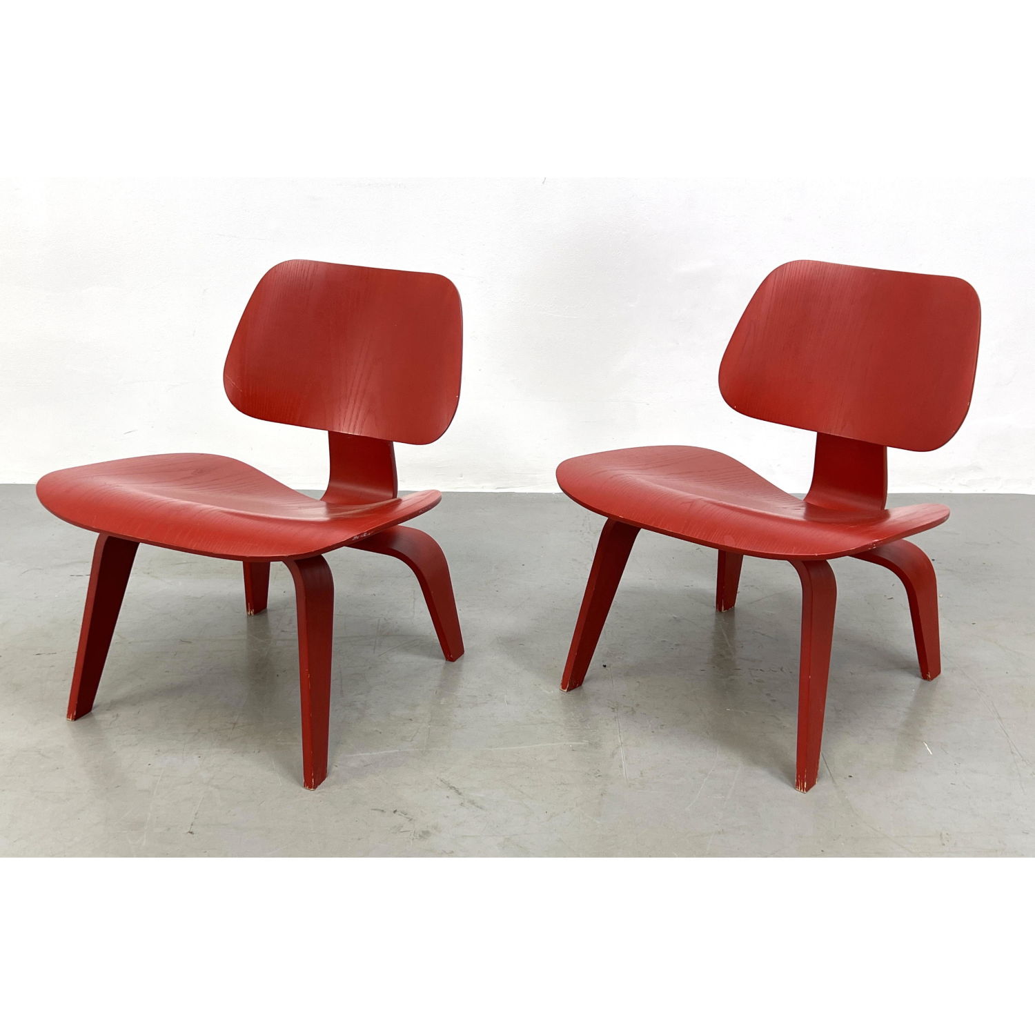 Appraisal: Pair of Red Herman Miller Eames chairs LCW Labeled Dimensions