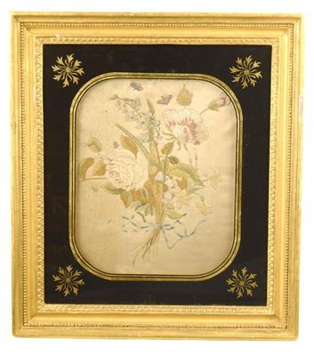 Appraisal: A th century embroidery depicting a ribbon-tied floral spray with