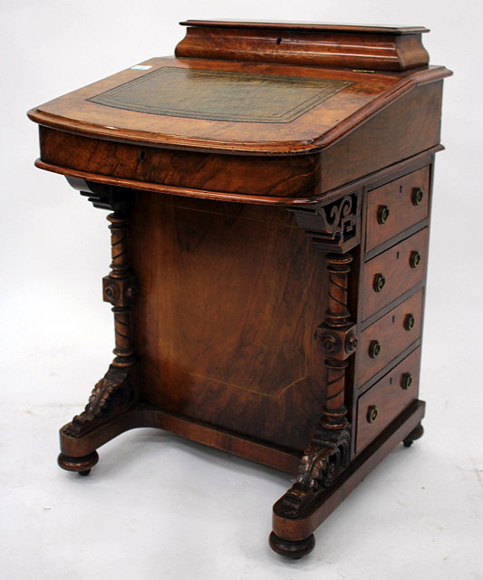 Appraisal: A VICTORIAN WALNUT DAVENPORT DESK with decorative boxwood inlay with