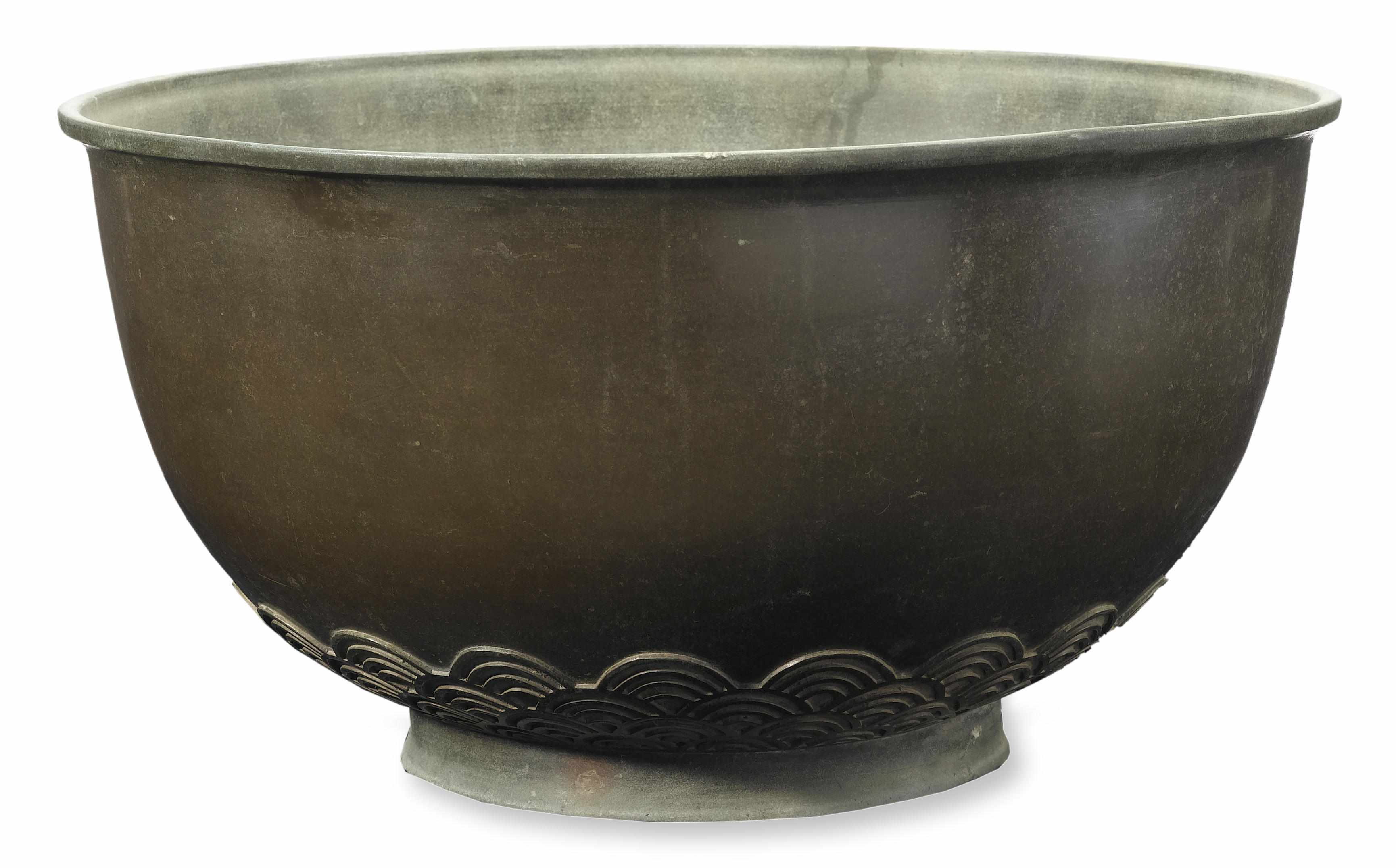 Appraisal: A large cast bronze bowl late th century China JapanFour