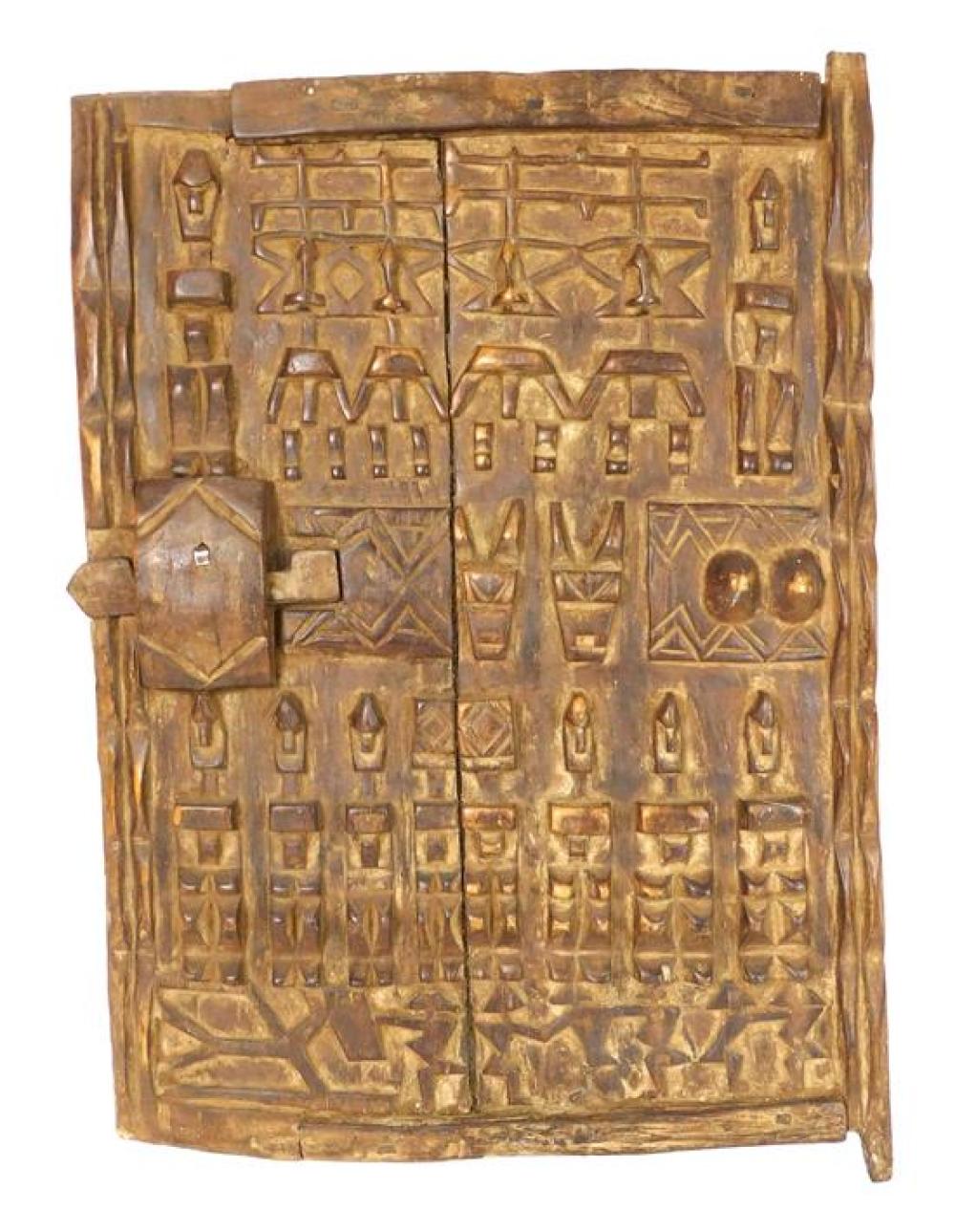 Appraisal: TRIBAL Dogon type grainery door th C African assembled carved