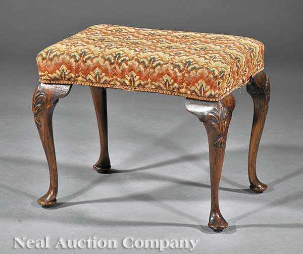 Appraisal: An Antique George III-Style Carved Walnut Stool rectangular needlepoint upholstered