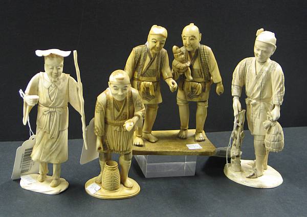 Appraisal: Four pieced ivory figural okimono Including a study of two