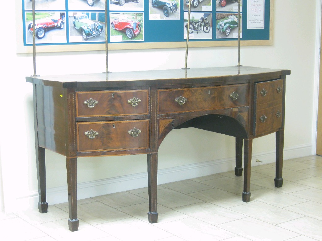 Appraisal: An early th Century mahogany bow-front Sideboard in the Sheraton