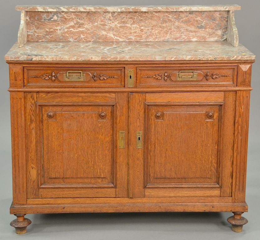 Appraisal: Continental oak server with marble top ht in wd in