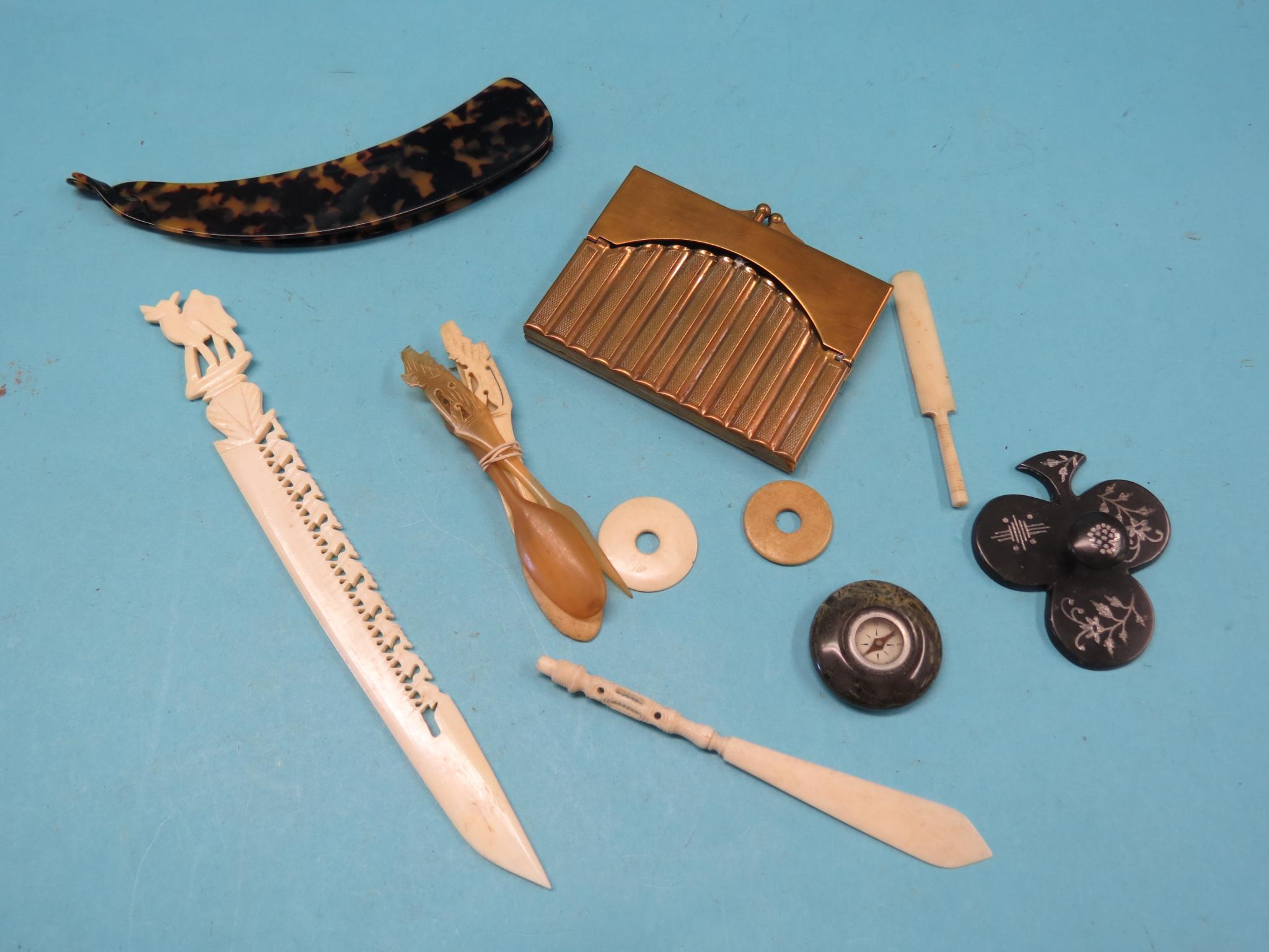 Appraisal: Small collectables including gilt-metal cigarette purse and carved bone paperknives