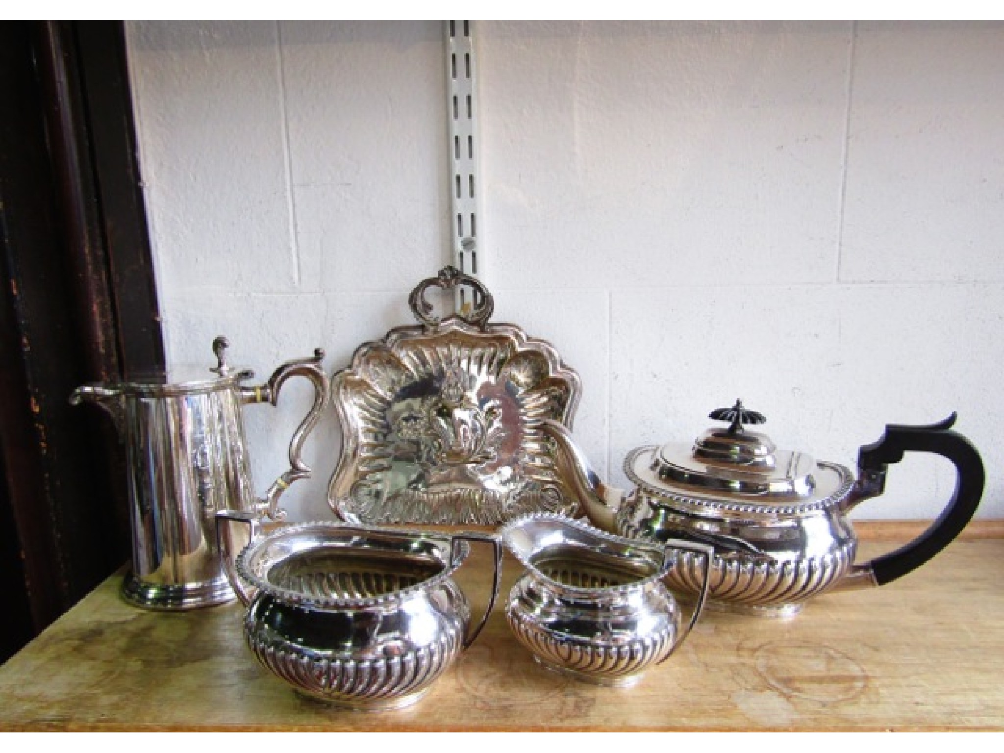 Appraisal: A Mappin Webb triple deposit three-piece tea set together with