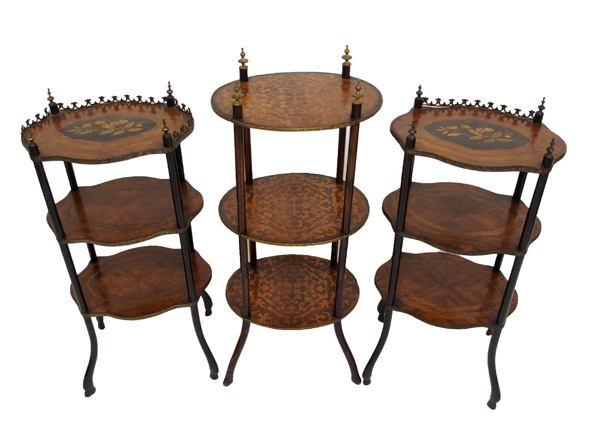 Appraisal: A pair of French rosewood and marquetry serpentine three tier