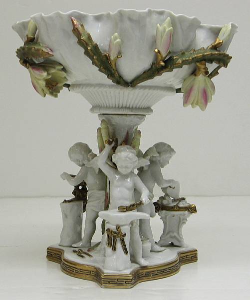 Appraisal: An English porcelain figural centerpiece Moore Brothers Longton Staffordshire fourth