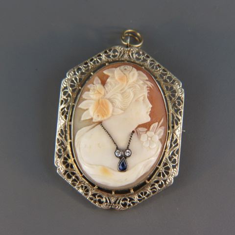 Appraisal: Cameo Brooch carved shell portrait of a lady wearing a